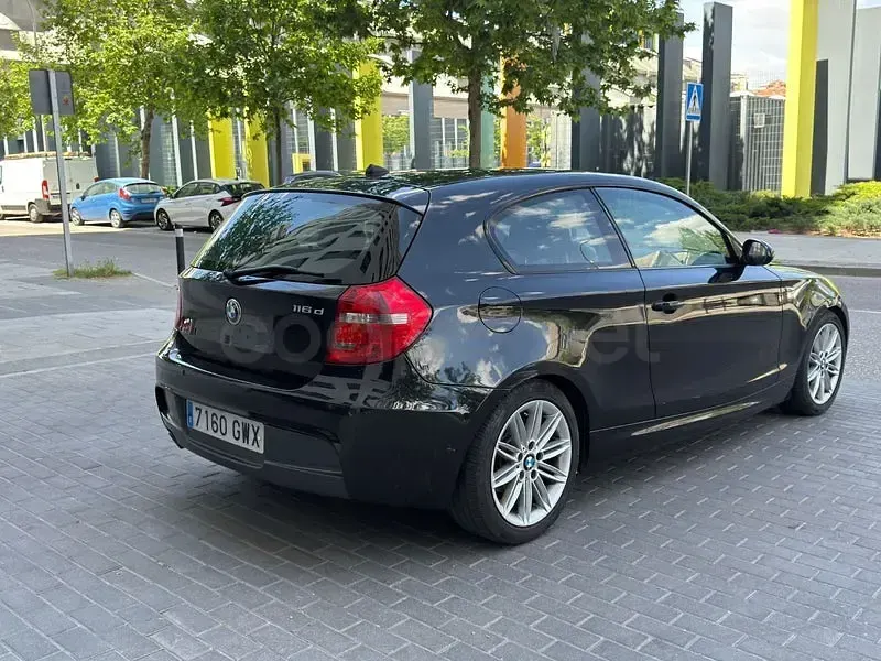 Usado BMW 116 115 CV (84 kW) 2010 Negro Utilitario