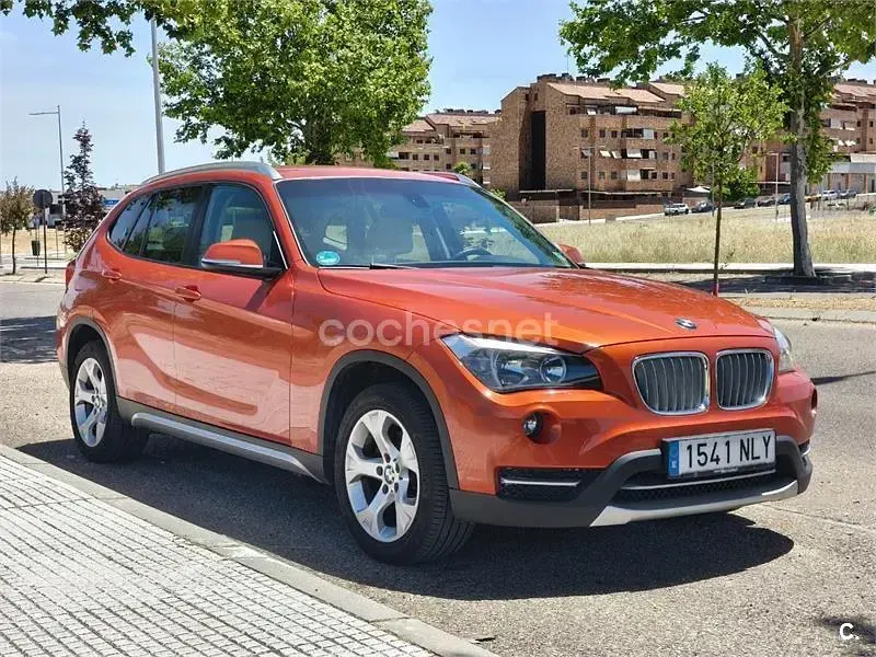 Usado BMW X1 xLine 143 CV (105 kW) 2013 Naranja SUV