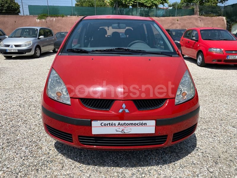 Usado Mitsubishi Colt Inform 95 CV (69 kW) 2005 Rojo Monovolumen