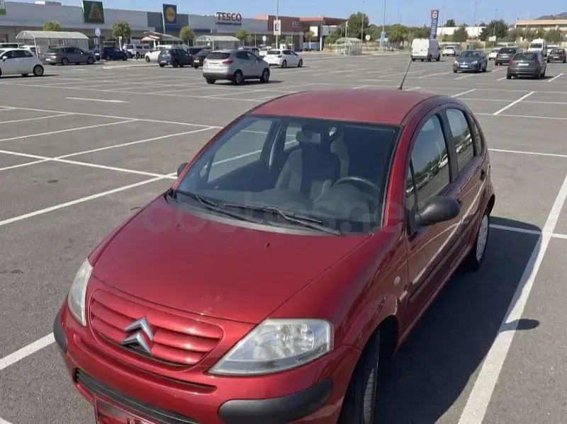 Usado Citroën C3 Furio 61 CV (44 kW) 2007 Granate Berlina