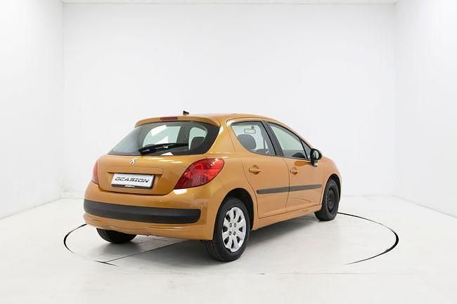 Usado Peugeot 207 75 CV (55 kW) 2007 Naranja Berlina