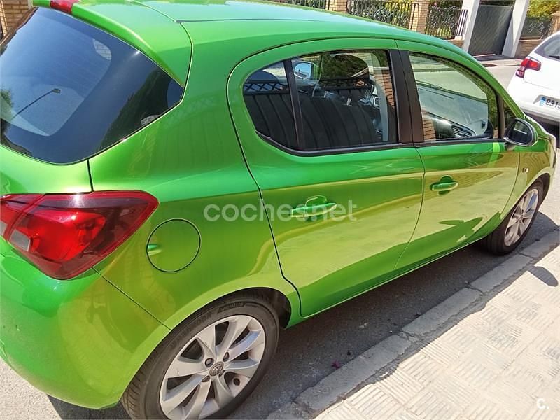 Usado Opel Corsa Selective 90 CV (66 kW) 2017 Verde Berlina