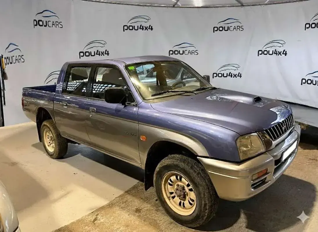 Usado Mitsubishi L200 99 CV (72 kW) 1998 Azul Pickup/Camioneta