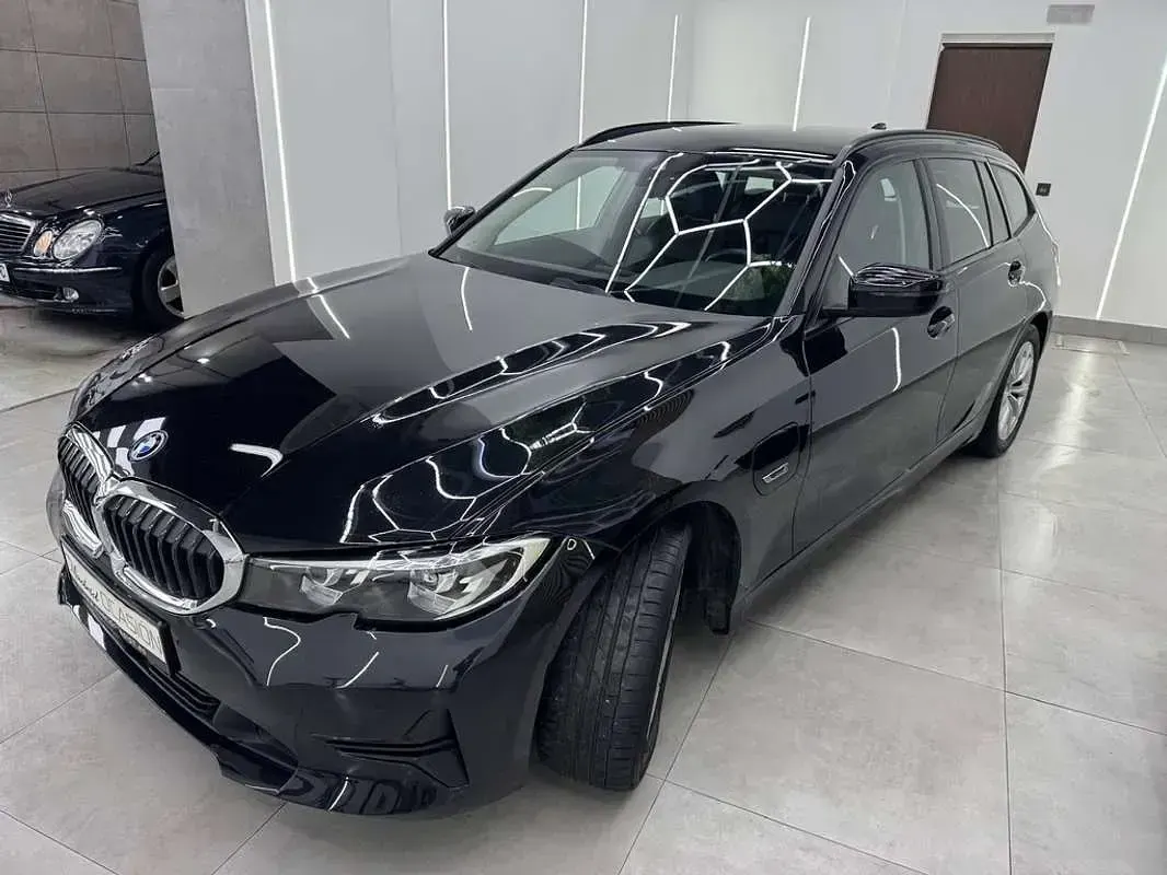 Usado BMW 320e 204 CV (150 kW) 2022 Negro Familiar