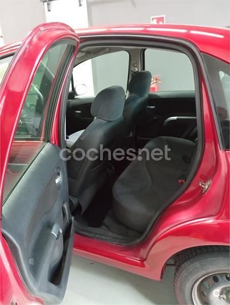 Usado Citroën C3 61 CV (44 kW) 2004 Rojo Berlina