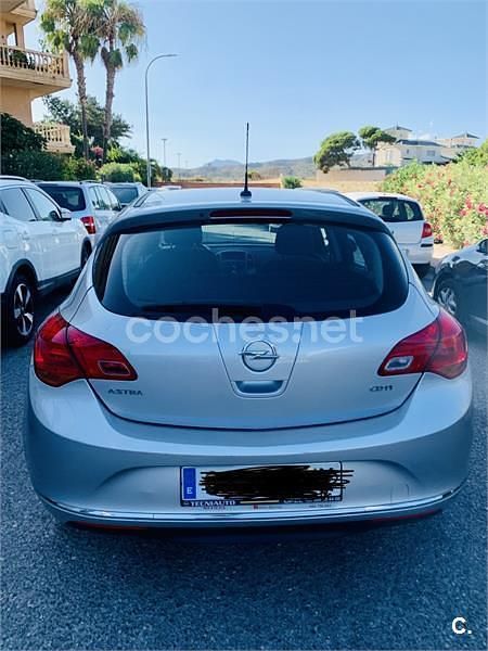 Usado Opel Astra Business 110 HP (80 kW) 2015 Cinzento Sedan