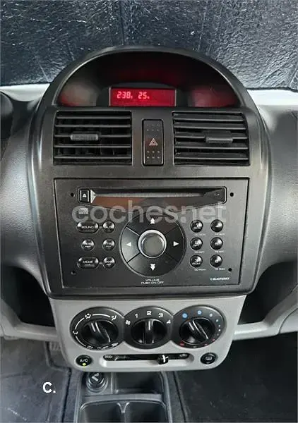 Usado Suzuki Ignis 69 CV (50 kW) 2006 Gris / plata Utilitario