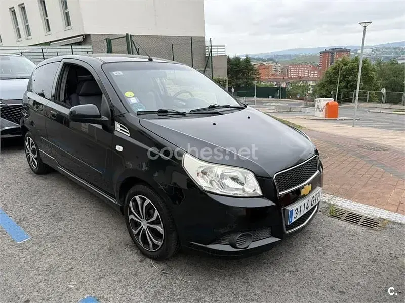 Usado Chevrolet Aveo LS 84 CV (61 kW) 2010 Negro Berlina