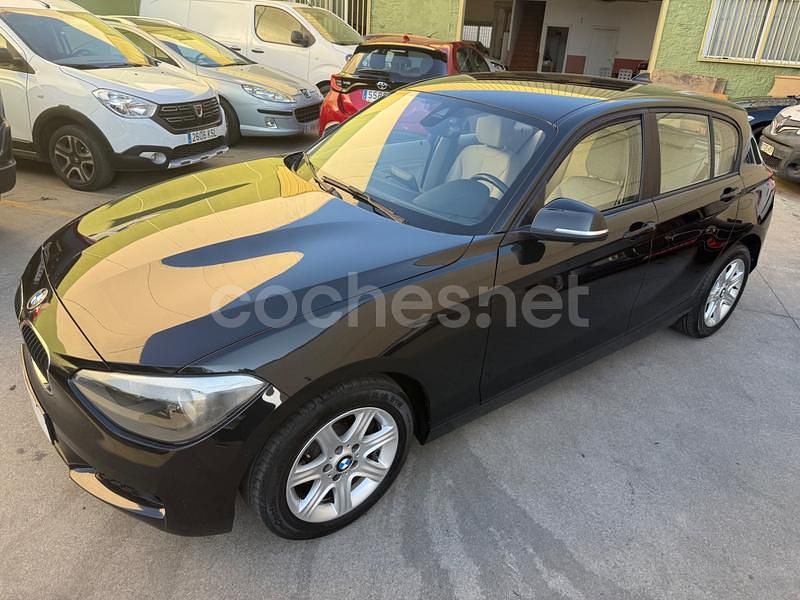 Negro Usado 2012 BMW 118 Comfort Edition Utilitario | 10.900 € (Precio justo) - Imagen 1/4