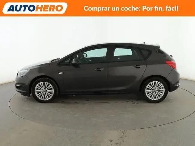 Usado Opel Astra Selective 110 HP (80 kW) 2014 Cinzento Sedan