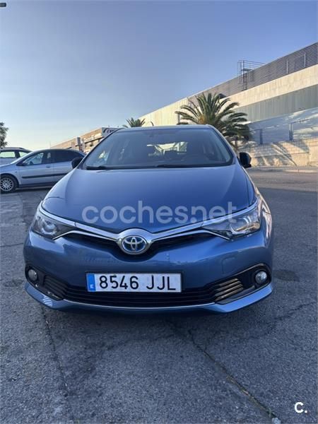 Azul Usado 2015 Toyota Auris Hybrid Berlina | 12.900 € (Buen precio) - Imagen 1/4