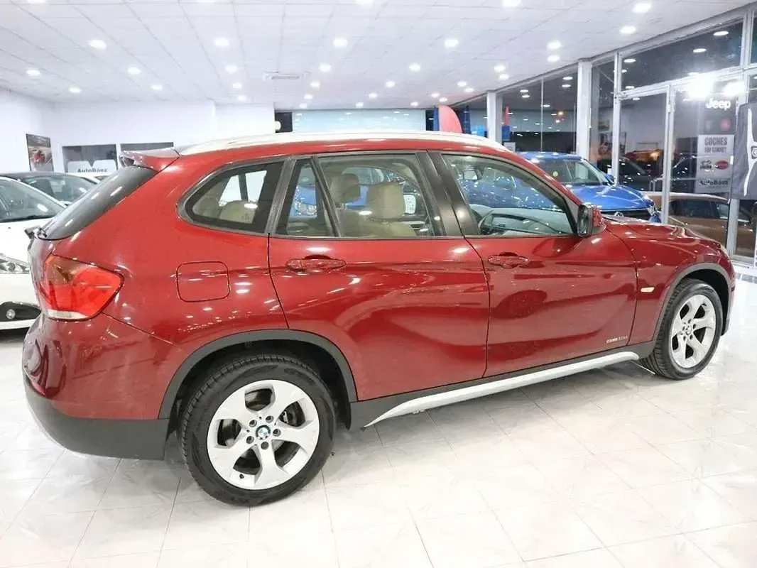 Usado BMW X1 143 CV (105 kW) 2011 Rojo SUV