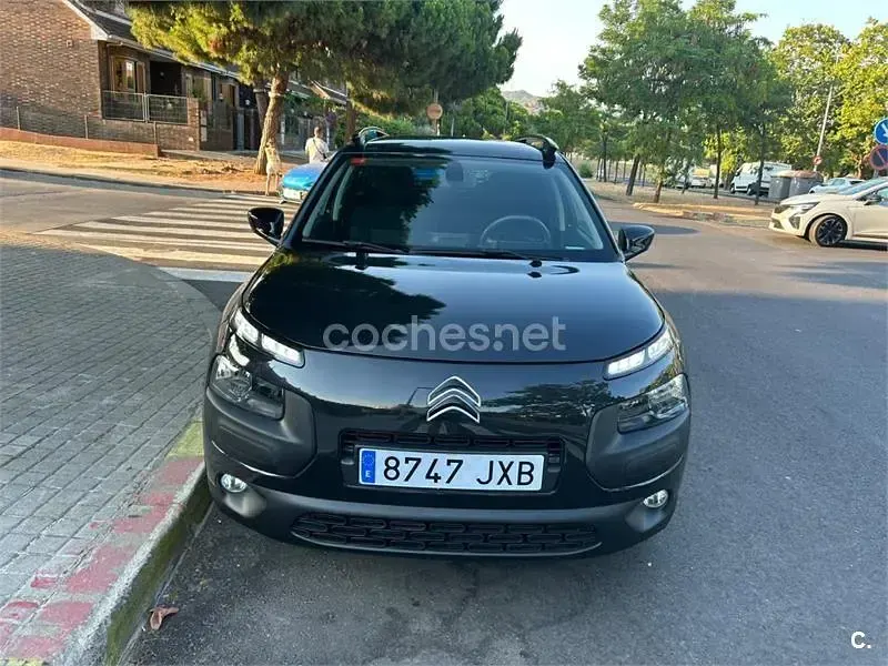 Usado Citroën C4 Rip Curl 100 CV (73 kW) 2017 Negro Berlina