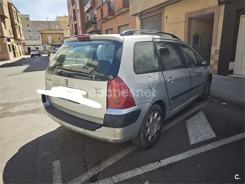 Usado Peugeot 307 90 CV (66 kW) 2006 Gris / plata Familiar