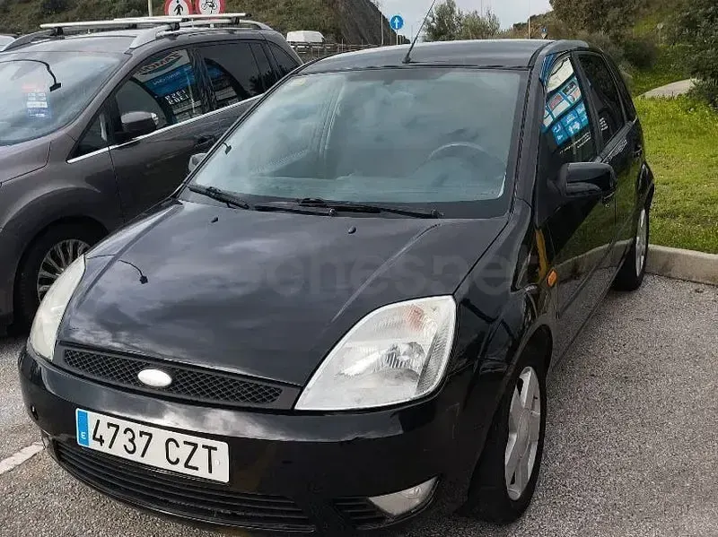 Usado Ford Fiesta Trend 80 CV (58 kW) 2004 Negro Utilitario
