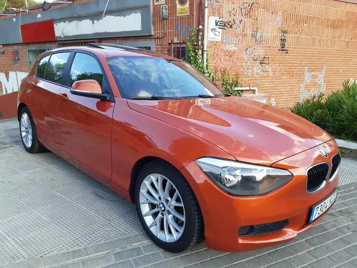 Usado BMW 118 143 CV (105 kW) 2012 Rojo Utilitario