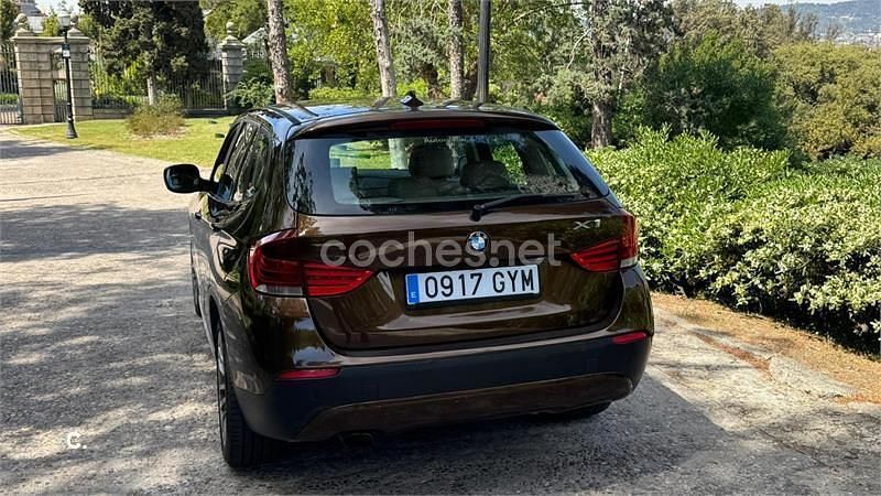Używany BMW X1 177 KM (130 kW) 2011 Brązowy SUV