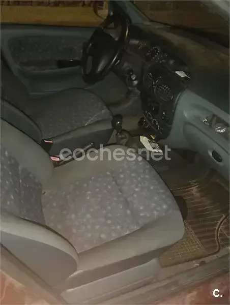 Usado Renault Mégane 75 CV (55 kW) 1998 Granate Berlina