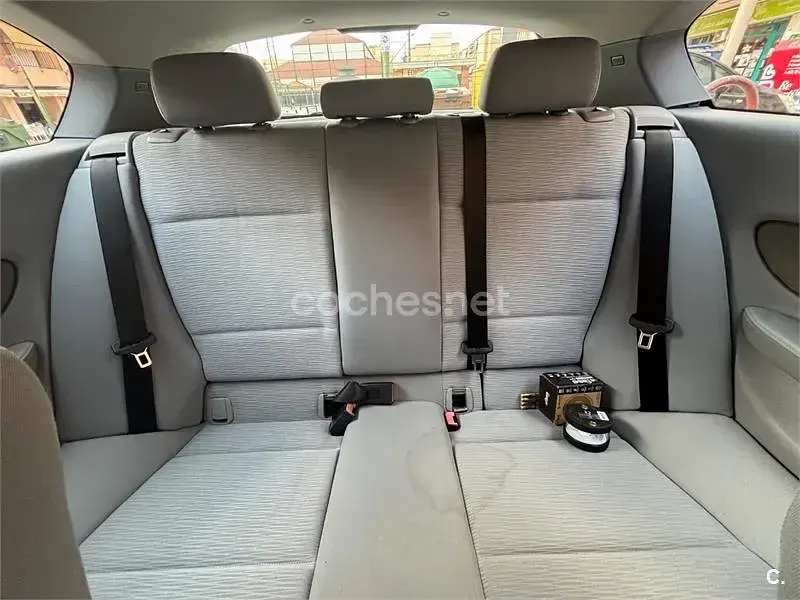 Usado BMW 116 115 CV (84 kW) 2010 Negro Utilitario