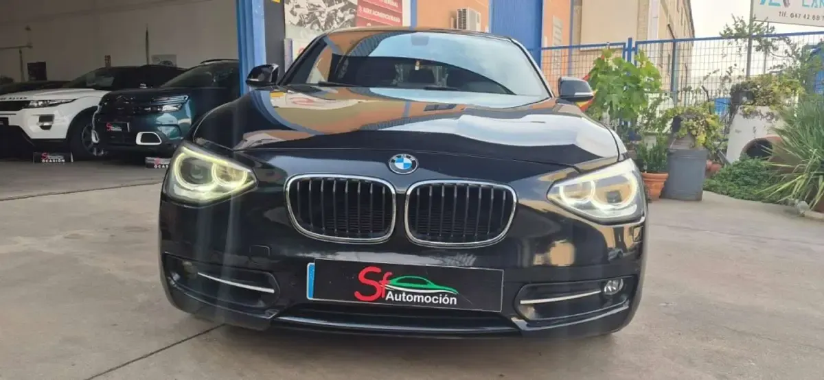 Usado BMW 116 116 CV (85 kW) 2012 Negro Utilitario