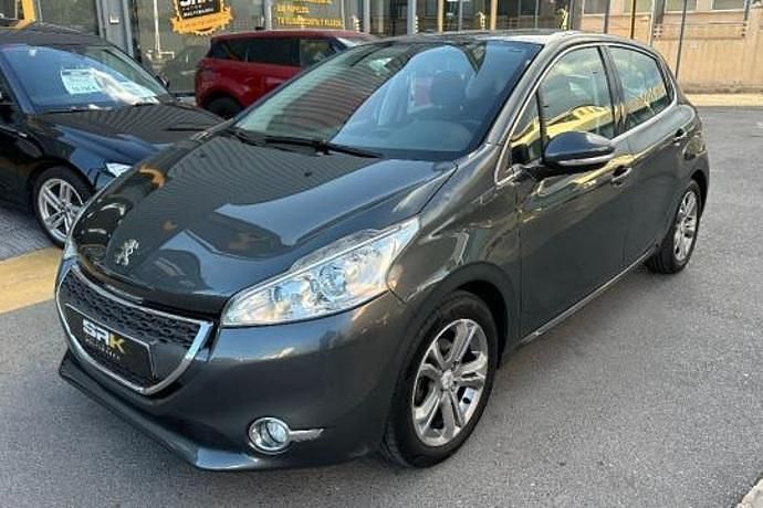 Gris Usado 2012 Peugeot 208 Allure Utilitario | 6750 € (Caro) - Imagen 1/4
