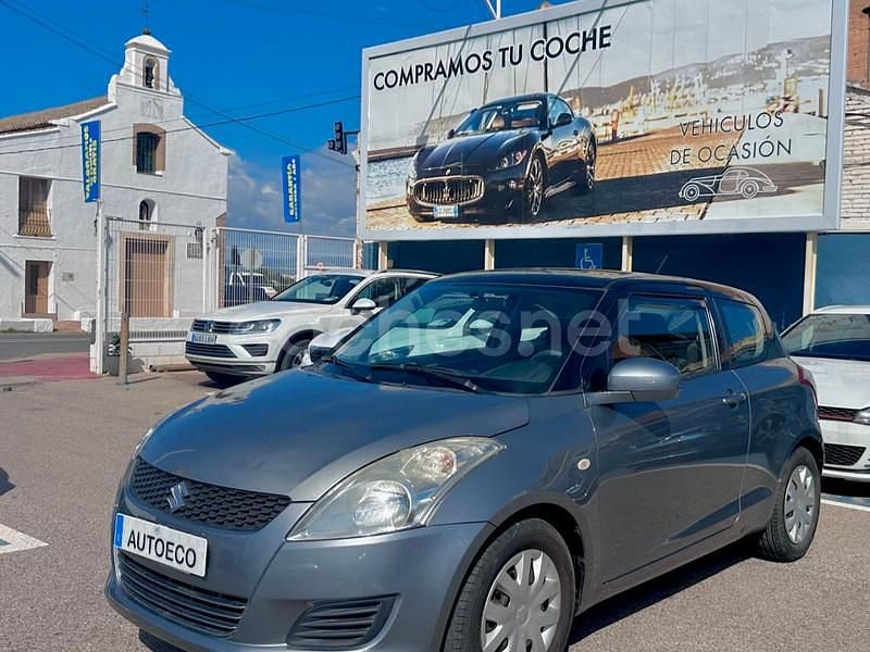 Gris / plata Usado 2012 Suzuki Swift Utilitario | 5490 € (Precio justo) - Imagen 1/4