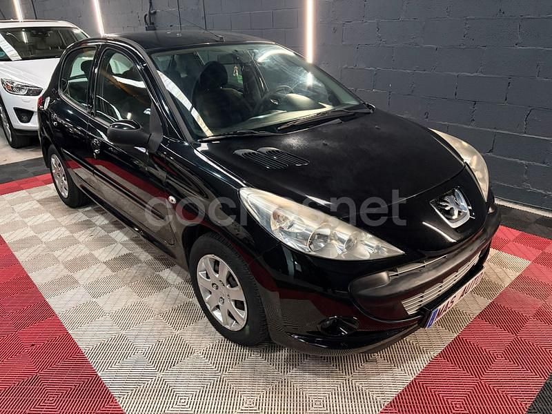Usado Peugeot 206+ 70 CV (51 kW) 2011 Negro Utilitario