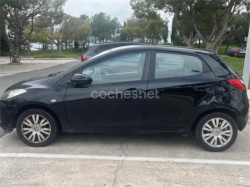 Usado Mazda 2 Active 75 CV (55 kW) 2009 Negro Utilitario