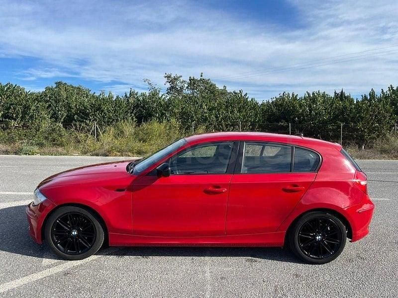 Usado BMW 116 115 CV (84 kW) 2010 Rojo Utilitario