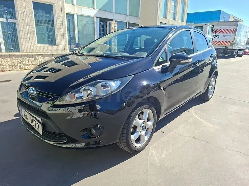 Usado Ford Fiesta Trend 90 CV (66 kW) 2009 Negro Berlina