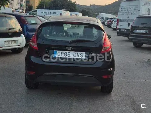 Usado Ford Fiesta Trend 82 CV (60 kW) 2010 Negro Berlina