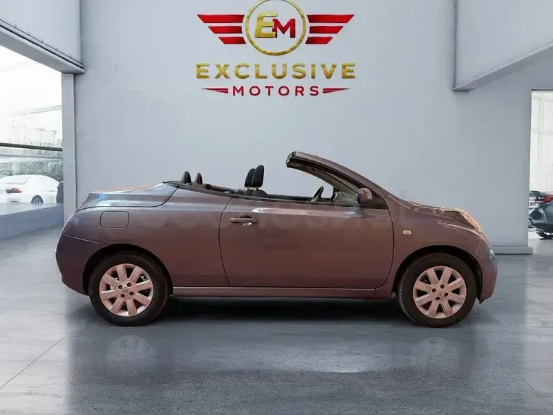 Usado Nissan Micra C+C Acenta 88 CV (64 kW) 2009 Gris / plata Descapotable