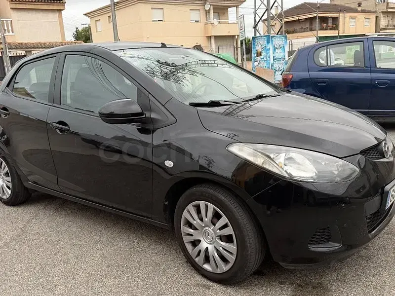 Usado Mazda 2 Active 68 CV (50 kW) 2009 Negro Utilitario