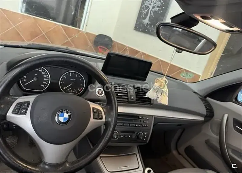 Usado BMW 118 129 CV (94 kW) 2006 Azul Utilitario