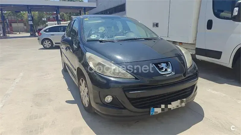 Usado Peugeot 207 Access 70 CV (51 kW) 2012 Negro Berlina