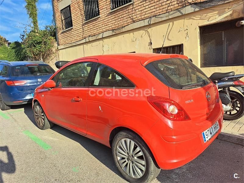 Usado Opel Corsa Selective 85 HP (62 kW) 2013 Vermelho Citadino