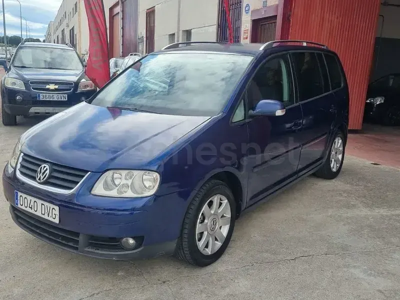 Begagnad VW Touran 105 HK (77 kW) 2006 Blå Minibuss