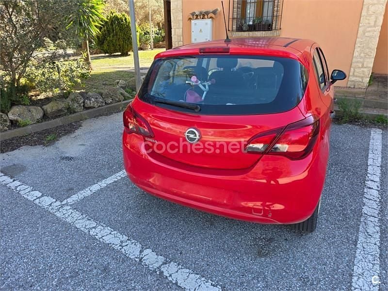 Usado Opel Corsa Expression 75 HP (55 kW) 2015 Vermelho Citadino