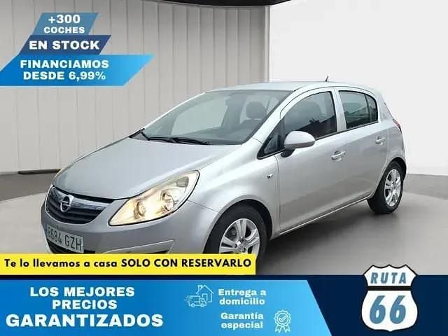 Usado Opel Corsa 86 HP (63 kW) 2010 Cinzento Sedan