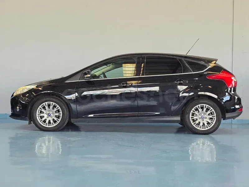 Usado Ford Focus Titanium 115 CV (84 kW) 2013 Negro Berlina