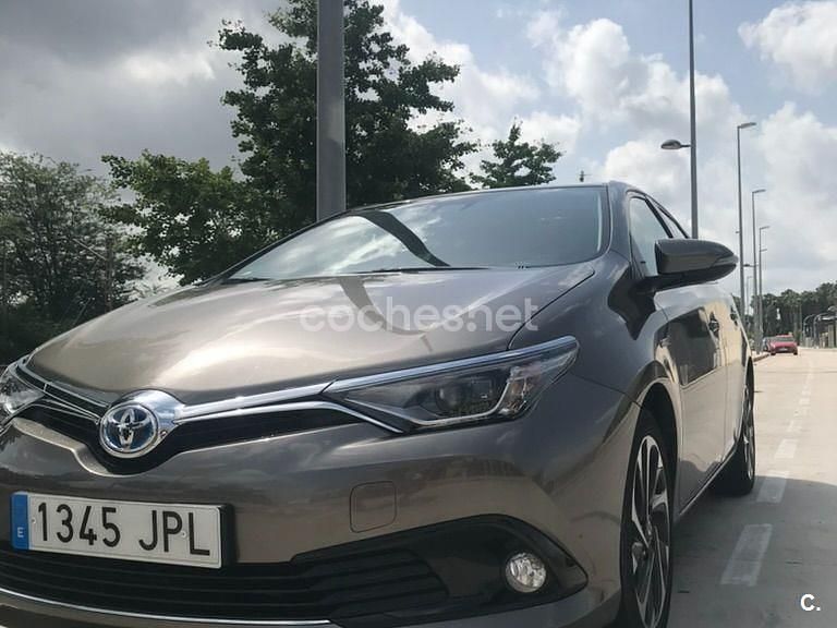 Beige Usado 2016 Toyota Auris Hybrid Berlina | 13.900 € (Precio justo) - Imagen 1/4