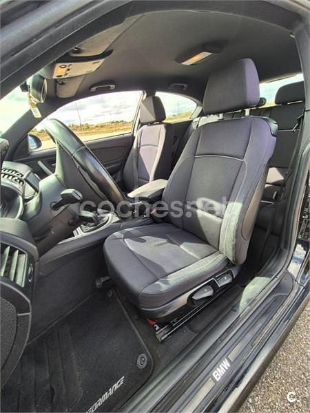 Usado BMW 118 143 CV (105 kW) 2007 Negro Utilitario