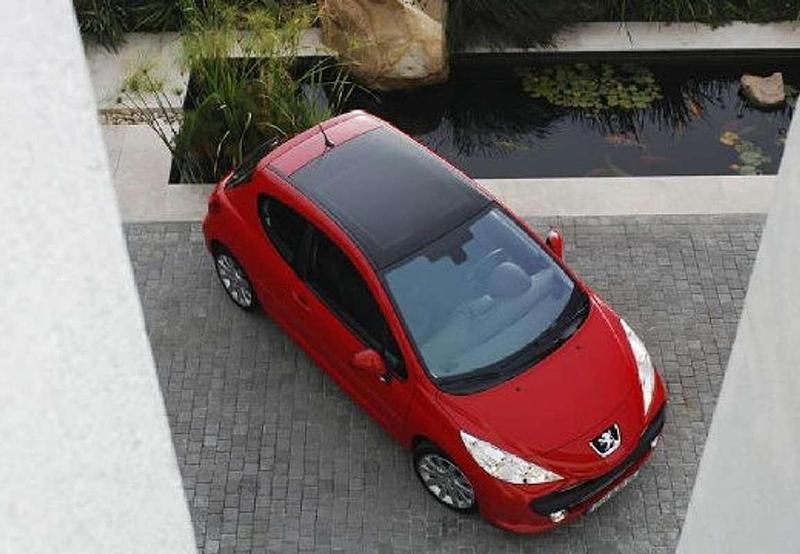 Gris Usado 2009 Peugeot 207 Sport Utilitario | 5800 € (Un poco caro) - Imagen 1/4