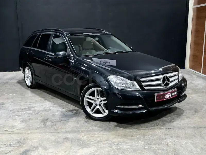 Usado Mercedes C200 136 CV (100 kW) 2012 Azul Familiar