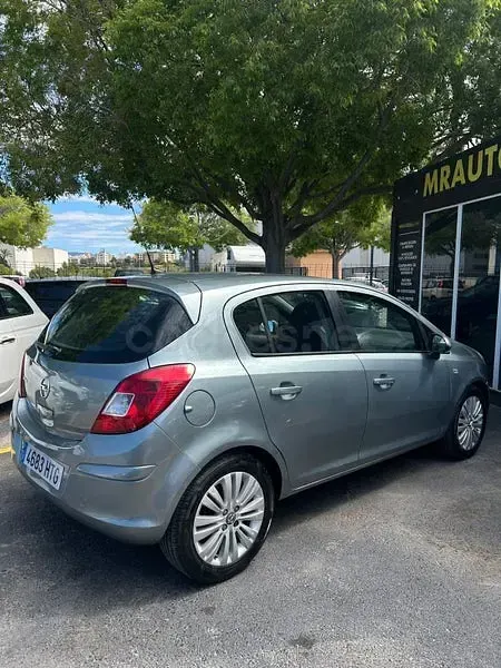 Usado Opel Corsa Selective 85 CV (62 kW) 2013 Azul Utilitario