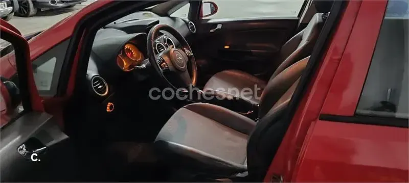 Używany Opel Corsa Cosmo 90 KM (66 kW) 2009 Czerwony Hatchback
