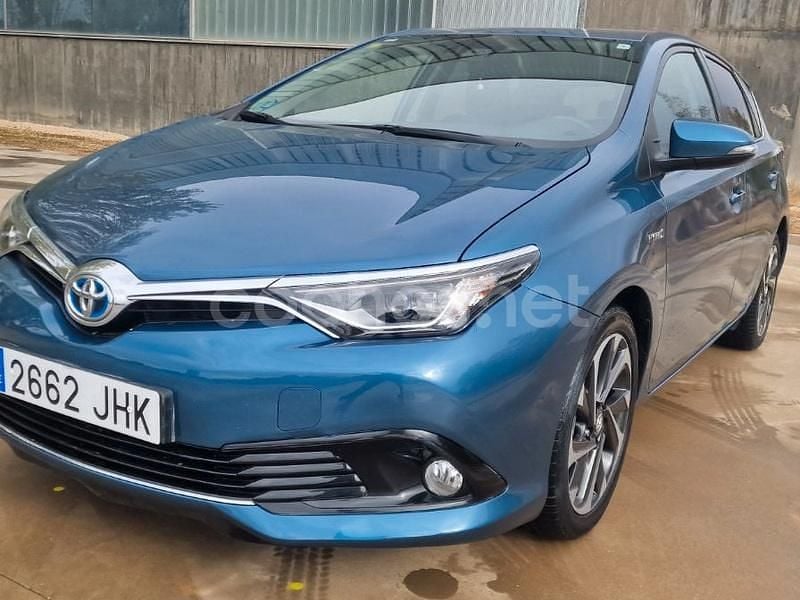 Usado Toyota Auris Hybrid Active 136 CV (100 kW) 2016 Azul Berlina
