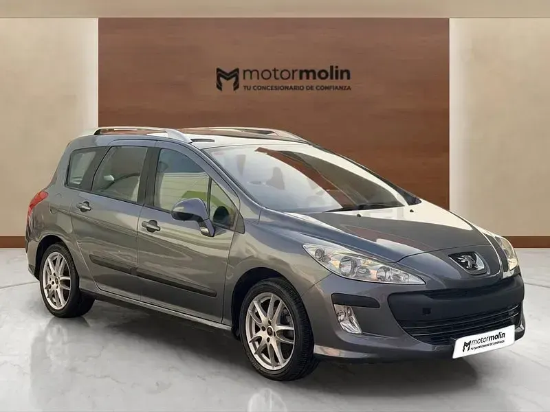 Usado Peugeot 308 SW 90 CV (66 kW) 2010 Gris / plata Familiar