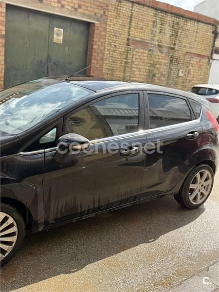 Usado Ford Fiesta Titanium 90 CV (66 kW) 2009 Negro Utilitario