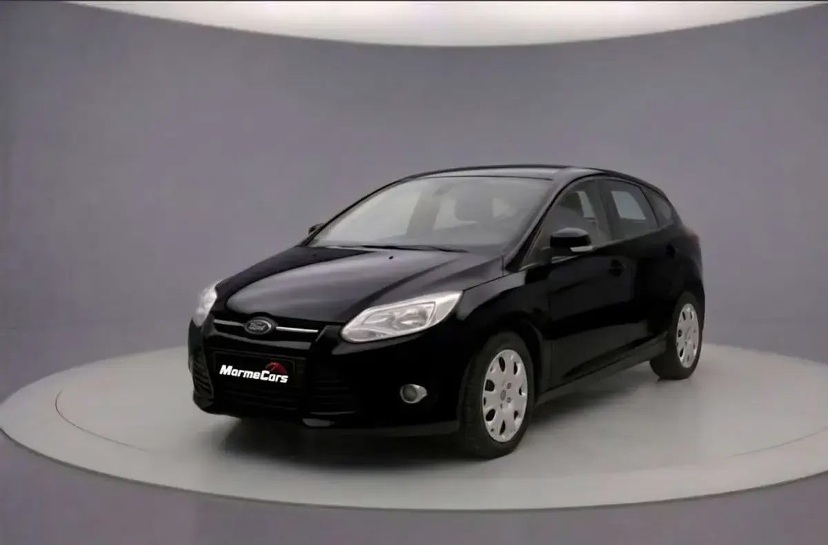 Usado Ford Focus Trend 114 CV (83 kW) 2012 Negro Utilitario